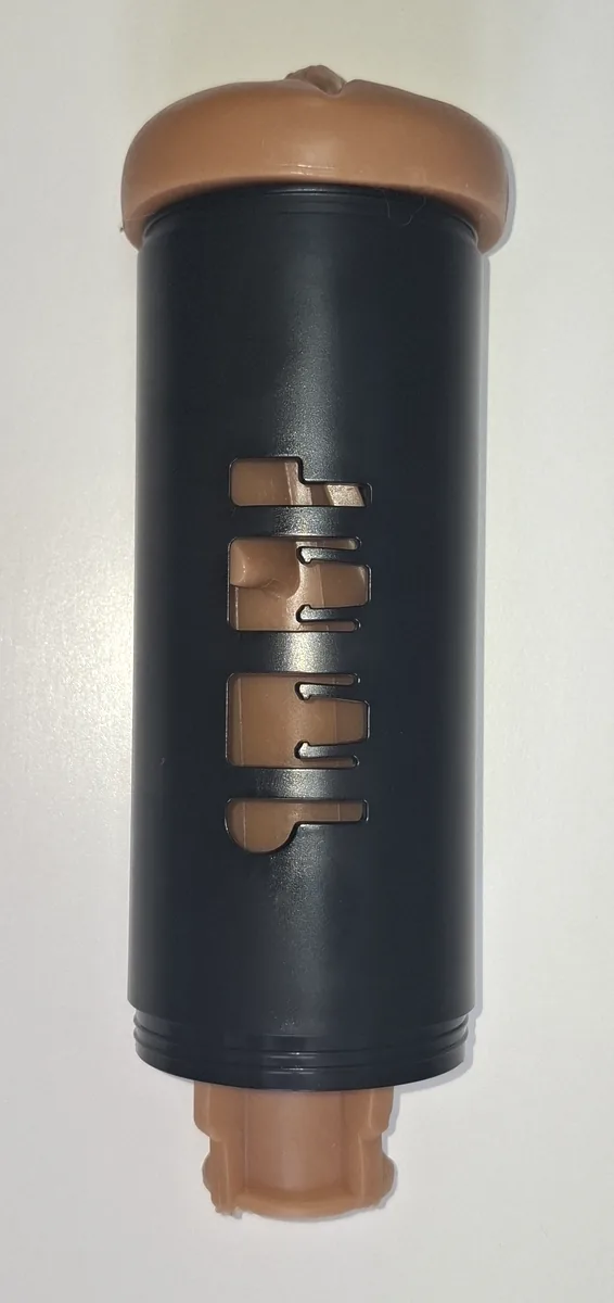 A Fleshlight sleeve seated into the Lovense Solace Pro housing, protruding slightly